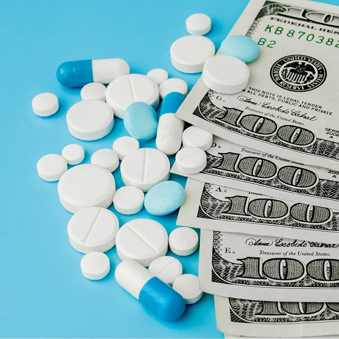 prescription pills on a table beside hundred dollar bills, featured image for blog post What Every Benefits Advisor Should Ask Their PBM